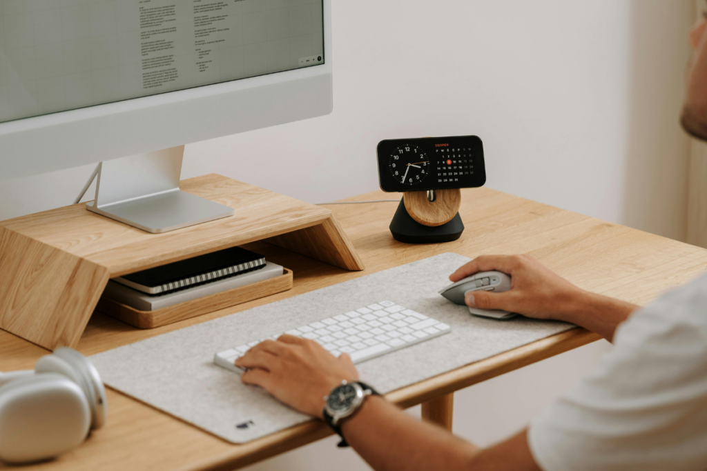 Image of a clean and organized workspace with motivational elements like a self-care vision board, representing the alignment of environment and goals for success.
