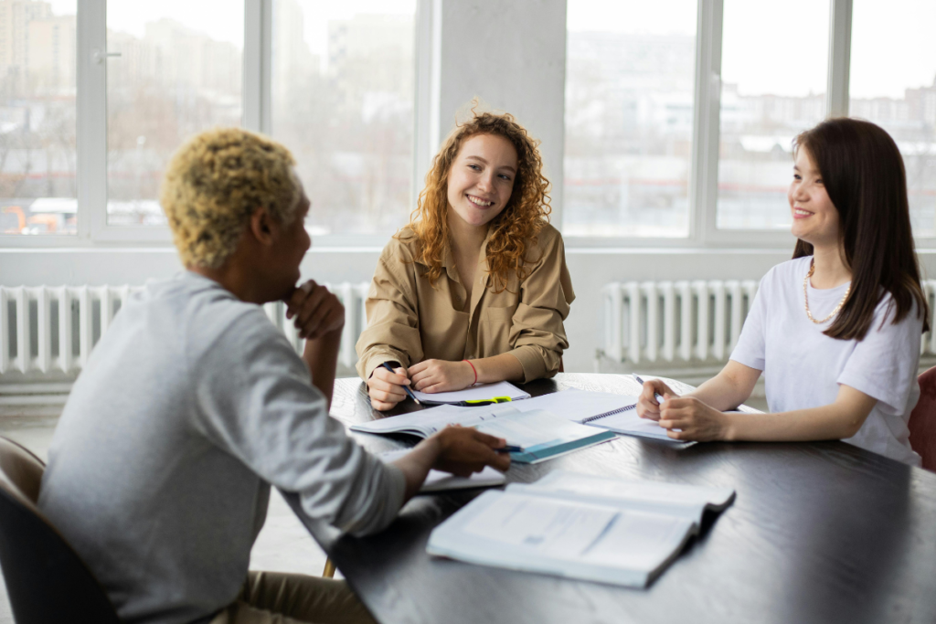 A group of friends supporting each other through positive interactions and mutual encouragement.